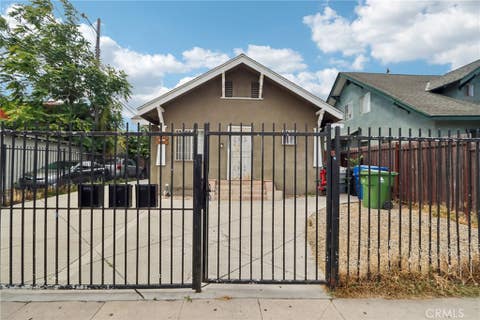 Photo of 1242 E 43rd PL, Los Angeles, CA 90011 (MLS # TR26153841)
