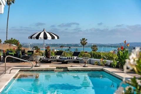 Photo of 2402 Alto Cerro Circle Cir, San Diego, CA 92109 (MLS # 260014822SD)