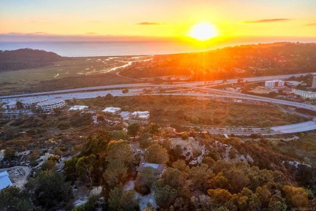 “WowCome” to this breathtaking 3.7 acre private and exclusive oasis nestled in the serene and desirable coastal community over looking Torrey Pines State Beach and Torrey Pines State Natural Reserve. This is a property that no one has, and does not exist anywhere in Carmel Valley. If you're searching for a once in a life time opportunity to a own something truly special, this property is for you. It is not just you who is looking for an opportunity. This estate is eagerly seeking for someone to unleash their vision on with its endless potential, and awaits a creative owner to transform it into a personalized masterpiece. This 3.7 acre exquisite estate offers 3 structures, one being the the 3,600 sq ft residence, 3 garages with a 988 sq ft bedroom and den above the garage. This unique residential location wows anyone when experiencing it’s expansive outdoor space that presents a tranquil retreat environment with easy access to world-class beaches, top-rated schools, upscale and vibrant shopping and dining.