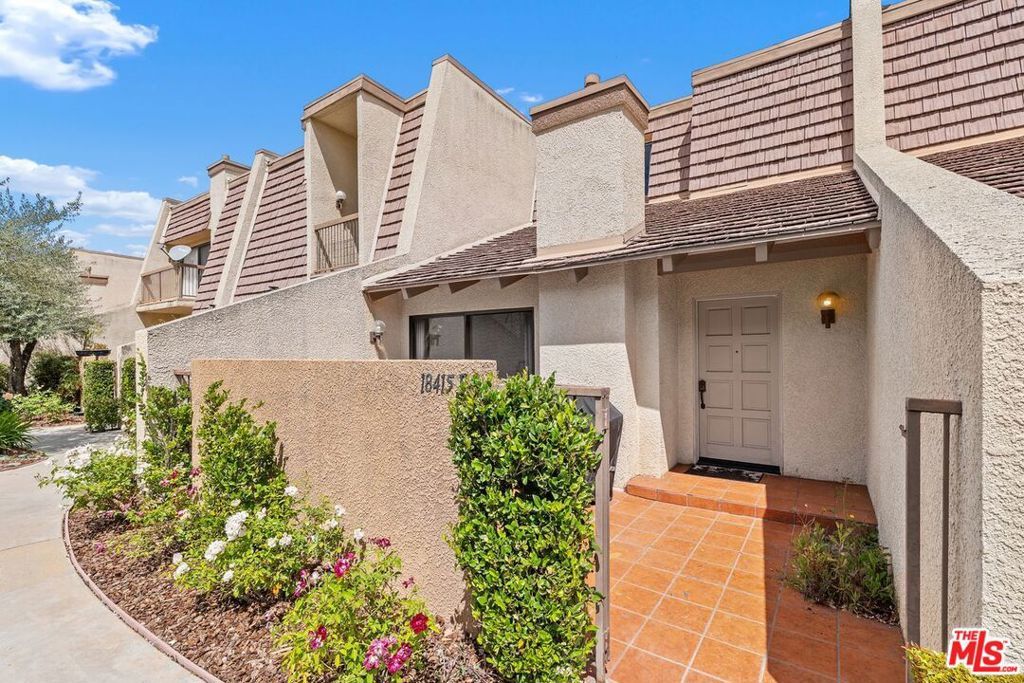 Photo of 18415 Collins Street #F, Tarzana, CA 91356 (MLS # 26751395)
