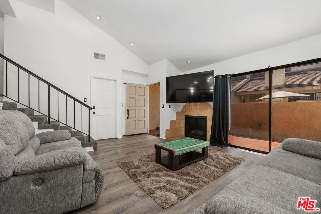 Photo of 18415 Collins Street #F, Tarzana, CA 91356 (MLS # 26751395)