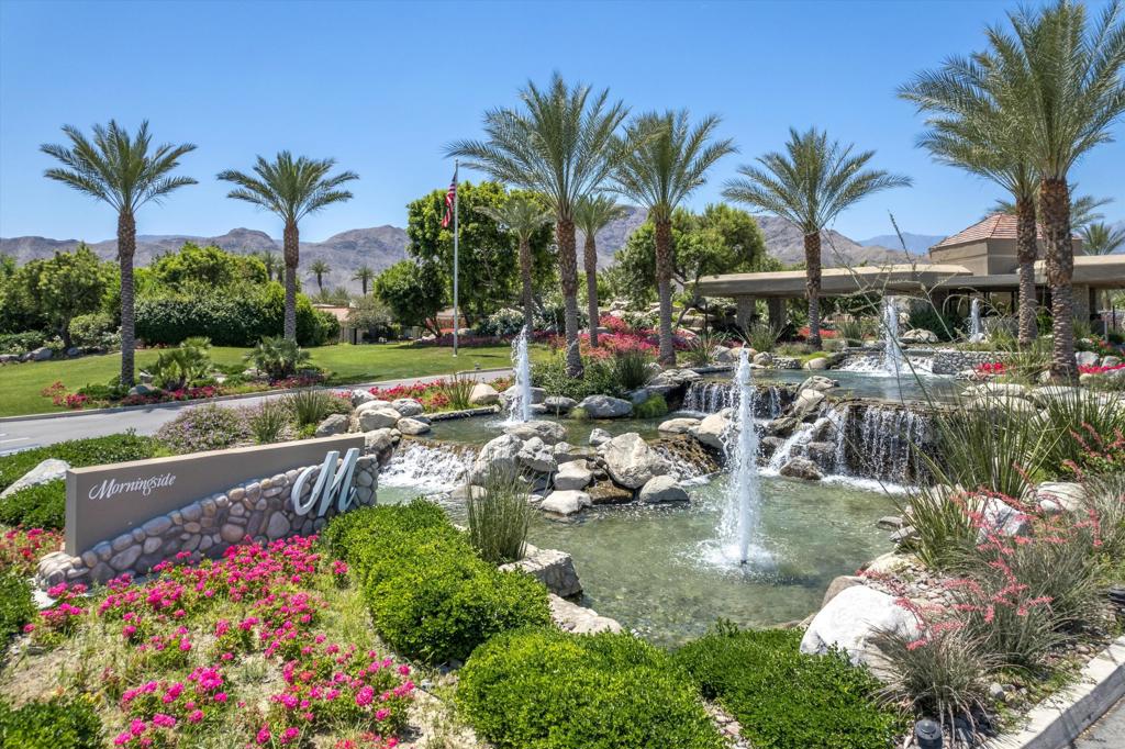 Welcome to this stunning home located in Morningside CC, Rancho Mirage, CA. This exquisite property has a bespoke floor plan designed by a Team of Architect, an NKBA award winning CKD, CBD and Interior Decorator. This stand-alone dream home is situated on a large, quiet cul-de-sac lot with a lake in back. As you enter thru the front gate you stroll past a large, redesigned pool with hot tub with cascading waterfall. The covered promenade leads to a 6 ft wide glass pivot door. The interior space is sunlit with floor to ceiling glass and multiple skylights throughout. The Living area features 16ft vaulted cathedral ceiling clad in wood w large beams and features a folding wall of windows which completely opens to create and indoor/outdoor living space open to south facing pool and beautiful mountain views. The LR features a custom bar area including a dishwasher, Scotsman ice maker and Miele wine column with Sommelier kit, custom cabinetry and quartzite waterfall counter. The flooring throughout is 48'' porcelain and is carried out to the outside from the dining area which also features a folding glass door wall affording al-fresco dining. The home features SONOS home entertainment system which provides the soundtrack for the family gatherings and celebrations that await. The Chef's kitchen features Miele steam oven, dishwasher, and separate refrigerator and freezer, Wolfe induction cooktop and Wolfe downdraft, custom cabinetry and Cambria countertops with a 15 ft island with seating for 4 and a built-in tv to catch your favorite cooking show! A unique powder room features a crystal light fixture, handmade mirror and custom ceramic basin and tile wall. The primary suite features two patios and a sitting area, programmable woven Hunter Douglass blinds and stunning chandeliers, his and her walk-ins with skylights and custom cabinetry. The primary bath features 10 ft ceiling and large windows with lake/mtn views. Two additional ensuites offer private patios, unique lighting, custom programable blinds. Large custom laundry room w Cambria counters, large sink and built-in ironing station w swivel, lighted board. The clothes dryer is located on raised platform for ease. Owned Solar Power on roof. Private Putting Green. Air-conditioned garage for two full sized vehicles plus golf cart. Live Life Fully at Morningside Country Club. Call for private showing and Clubhouse tour. Raymond 760 485-4586.