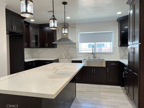 Photo of 8312 Devenir Avenue, Downey, CA 90242 (MLS # PW25175869)