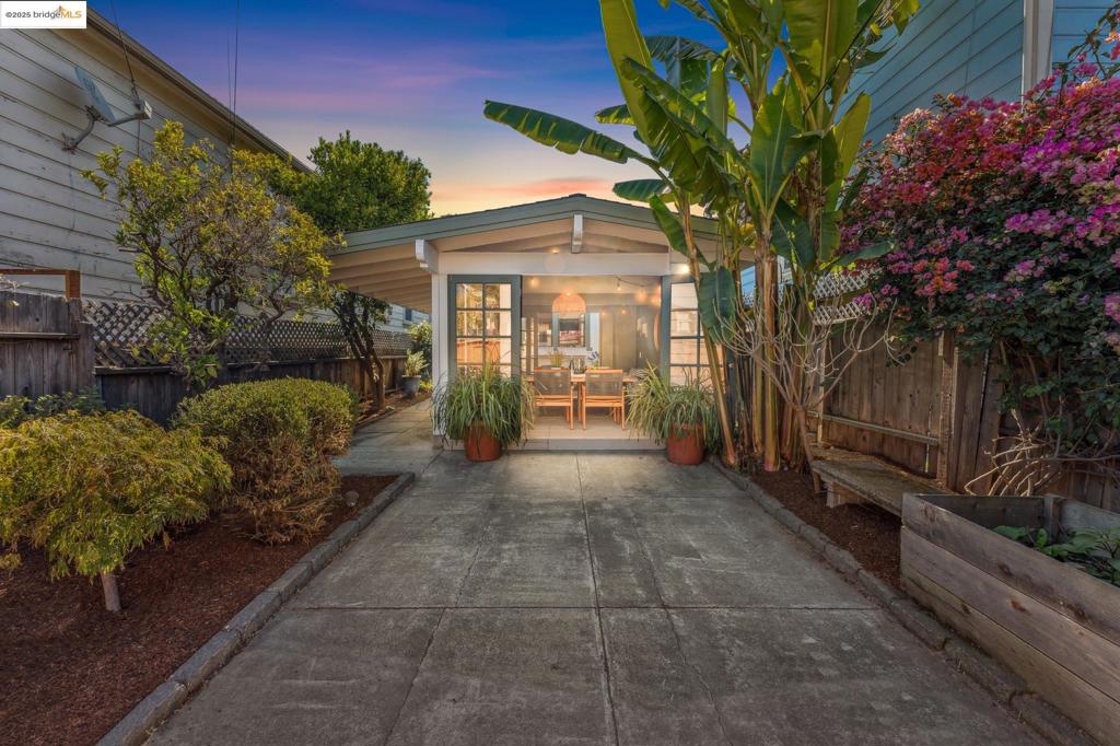 Tucked behind a sweet, private garden with mature fruit trees, this lovingly maintained and thoughtfully updated home offers a peaceful retreat just minutes from BART for those looking for a quick commute to downtown San Francisco. Enjoy flexible living as a 3-bedroom, 2-bath home or a 2-bedroom, 1-bath with a spacious guest suite with a separate entrance. The large covered lanai and tranquil outdoor spaces make entertaining or enjoying outdoors a delight. Whether you like to entertain or need space for hobbies, this home offers the flexibility for any lifestyle. With an updated kitchen, refreshed fixtures and finishes, new luxury vinyl flooring, and fresh interior/exterior paint, you will feel right at home. Skylights, new luxury vinyl, and tile floors add warmth and charm. Have the flexibility to park off-street or in the driveway behind the updated front fence. This home is ready to move in and to be loved for many years to come. A rare combination of location, flexibility, and garden serenity in the heart of the Bay.