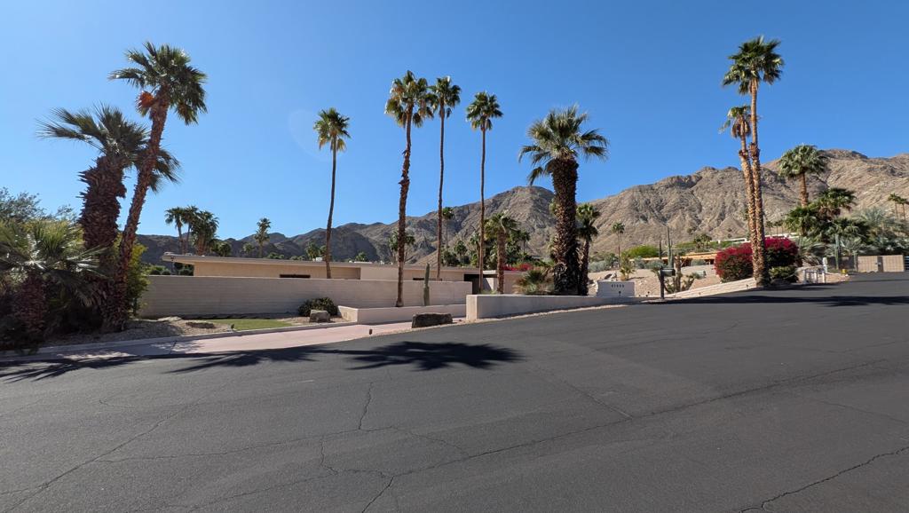 Almost feels like Royalty as you peer over the Coachella Valley. Large open air feel with sunken bar and the Pinkest kitchen you have ever seen. Very Mid Century feel here. Massive valley views from virtually anywhere in this home . Lots of elbow room here. Call for details