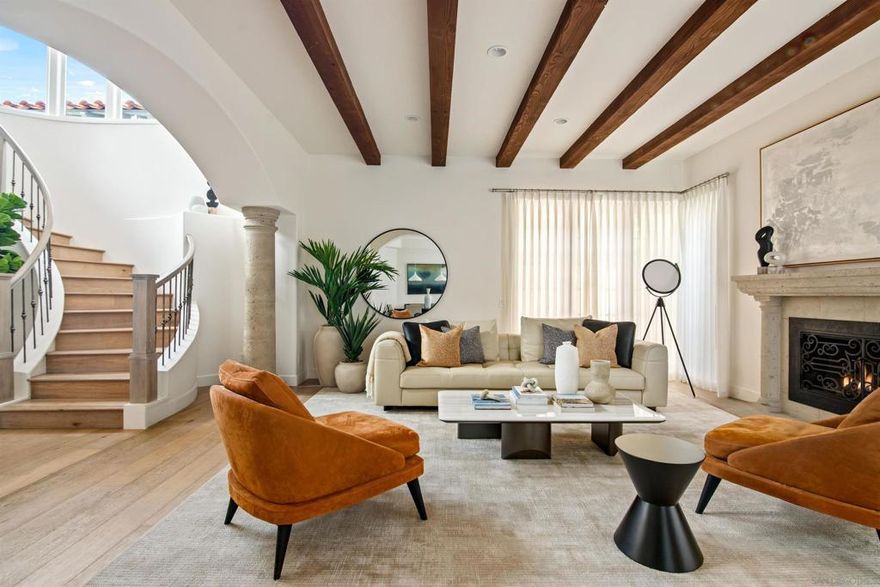 This stylish 3-bedroom, 2.5-bath townhome is located in the highly walkable and vibrant La Jolla Village neighborhood, just minutes from the beach, local dining, shops, and coastal trails. With thoughtfully designed interiors and high-end finishes throughout, the home offers an ideal setting for long-term stays in one of San Diego’s most desirable seaside communities. The main floor features an open-concept living space filled with natural light, a comfortable sectional sofa, a fireplace, and curated artwork that adds a warm, contemporary touch. The adjacent dining area leads into a sleek, modern kitchen with marble countertops, a center island, and premium appliances. French doors open to a private patio, perfect for relaxing or entertaining, with stylish outdoor furnishings and lush greenery providing a serene atmosphere. Upstairs, the primary suite offers a king bed, vaulted ceilings, a fireplace, a wall-mounted TV, and an ensuite spa-like bathroom with a soaking tub, dual vanities, and a walk-in shower. The second bedroom includes a queen bed, while the third bedroom features a full bunk bed and a cozy setup ideal for kids or visiting guests. A second full bathroom upstairs, and a powder room on the main level adds extra convenience. The home includes central air conditioning and heat, in-unit laundry, two garage parking spaces (with key access), and driveway parking. No pets are allowed. A 30-night minimum stay is required. Sleeping Accommodations (Maximum Occupancy 6): Bedroom 1 - 1 King bed - Bedroom 2 - 1 Queen bed - Bedroom 3 - 1 Bunk Bed - There are 2.5 bathrooms.