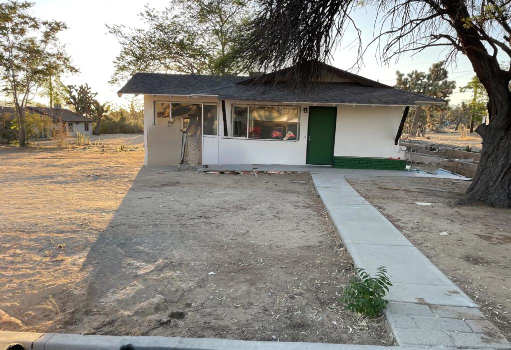 Great opportunity to own a charming 3-bedroom, 1-bath home on an approximately 19,000 SF lot. It is currently being updated with new tile, new carpet, new cabinets, new countertops, new shower, sinks, LED lights, and more. The open kitchen includes an island. This home is on a fee land and you own the lot, no HOA. Your imagination will run wild with the open and vast backyard, making it the perfect place to start a backyard project. This property is suitable as a short-term rental, investment property, vacation home, or first-time residence. Buyers may look into different financing options like FHA, VA, 0% down, or Seller May Carry. (Buyers MUST verify with the City the availability of a short-term rental permit if applicable). This home is located near town life, including shops, restaurants, stores, and special events like the Gubler Orchid festival. Additionally, it lies between the lush Palm Springs, Joshua Tree National Park, and neighboring cities. Come see this wonderful home TODAY!