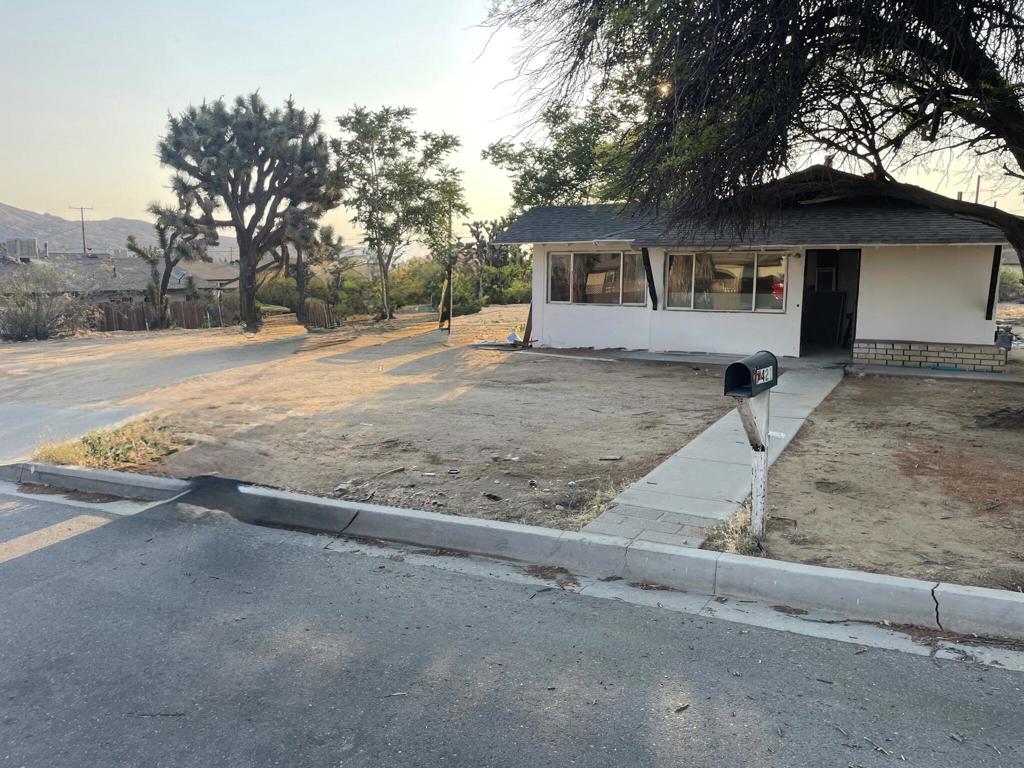 Great opportunity to own a charming 3-bedroom, 1-bath home on an approximately 19,000 SF lot. It is currently being updated with new tile, new carpet, new cabinets, new countertops, new shower, sinks, LED lights, and more. The open kitchen includes an island. This home is on a fee land and you own the lot, no HOA. Your imagination will run wild with the open and vast backyard, making it the perfect place to start a backyard project. This property is suitable as a short-term rental, investment property, vacation home, or first-time residence. Buyers may look into different financing options like FHA, VA, 0% down, or Seller May Carry. (Buyers MUST verify with the City the availability of a short-term rental permit if applicable). This home is located near town life, including shops, restaurants, stores, and special events like the Gubler Orchid festival. Additionally, it lies between the lush Palm Springs, Joshua Tree National Park, and neighboring cities. Come see this wonderful home TODAY!