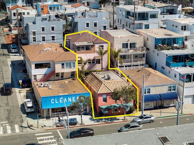 Two blocks from the beach, surrounded by a vibrant retail scene, this four-unit property offers the opportunity to unlock significant upside potential through strategic renovation and repositioning. Separated into two structures, there is a ground-floor commercial space on Highland Avenue, and above it, a spacious 2-bedroom, 1-bathroom apartment boasts its own private outdoor living area. The rear building on Crest Drive hosts a cozy 1-bedroom, 1-bathroom unit with a private patio, and above it, spectacular unobstructed ocean views from Catalina to Malibu are enjoyed in the 3-bedroom, 2-bathroom unit. With strong rental demand and endless lifestyle appeal, this property offers both steady income today and exceptional upside for tomorrow in one of Southern California’s most coveted coastal markets.