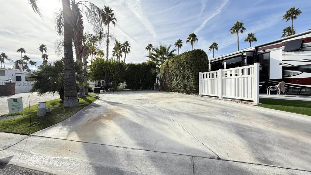 Lot 743, Located on the west side of Golf Course Drive, this lot is surrounded in the rear and the service side with 12 foot hedges and a blooming grapefruit tree. A short walk to the El Seguro clubhouse and starter shack. A privacy screen is on your patio side, allowing for You and your guest to entertain without interruption. Outdoor Resort Palm Springs (ORPS) is a Guard Gated 5-Star RV Resort Community offering an active and luxurious lifestyle featuring golf (27 holes), tennis, pickleball, swimming and more! Two clubhouses, fitness center, beauty solan, La Roma Restaurant on campus, dog park and more!