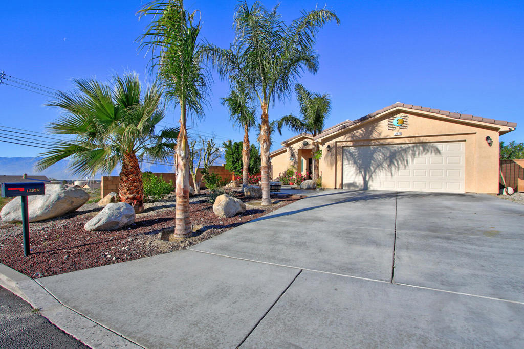 Welcome to The Desert Lifestyle! This 4 bd, 2 ba beautiful newer home was built on 2018 with 1,650 sqft, sits on an elevated lot. The front yard with professional landscaping designed invites you to enter into the impressive open floor plan with vaulted ceilings, and nice tile flooring throughout. Living room combined with dining area leads you towards the delightful kitchen featuring nice granite countertops, backsplashes, and abundant cabinetry. Master bedroom features walk-in closet, granite counters, and slided door. Step outside to your private oasis, dive into the tranquility of the backyard meticulously designed with rocks and palm trees. Two cars garage, very calm neighborhood. Enjoy the amazing mountain and city views. Desert Hot Springs is conveniently located minutes away from Hwy 1-10, Palm Springs Airport, Nice restaurants, casinos, and surrounded Desert Cities. This gems offers Solar Panels to avoid high electricity bills during summer. No HOA, you own the land.