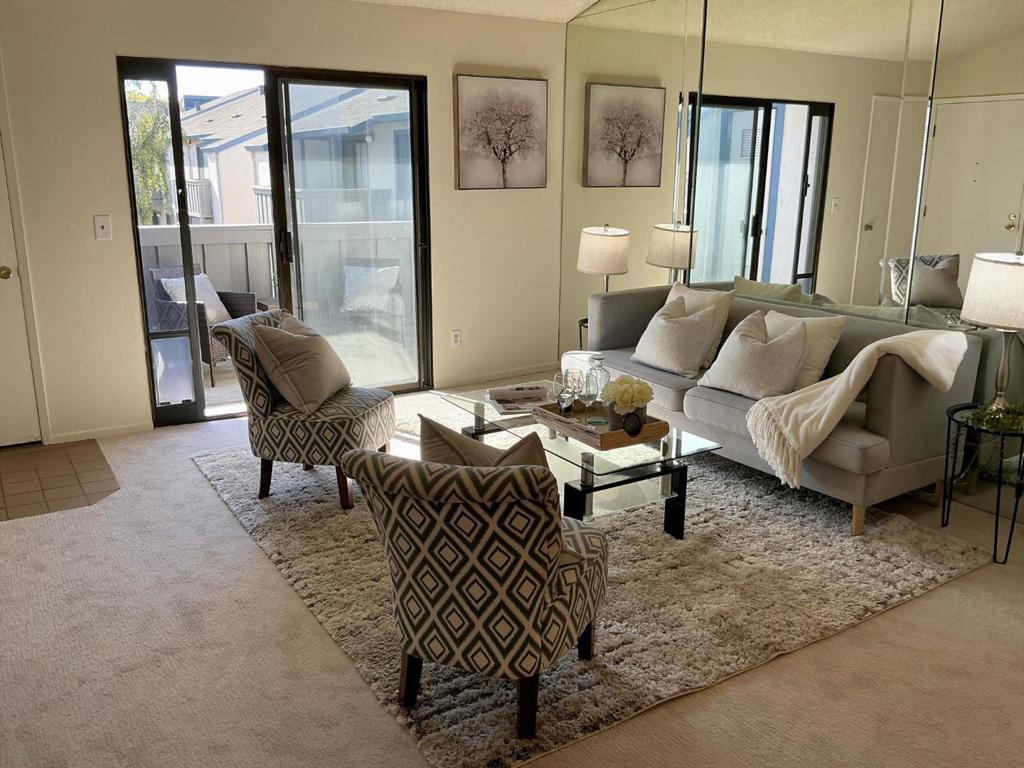Enjoy living in the beautiful garden condo complex of Bay Breeze in San Mateo. Townhouse style unit with private entry. Top floor, single story unit, light and airy with vaulted ceilings, freshly painted, new carpets. Dramatic Living Room with vaulted ceiling sliding glass door to your private deck. Separate Dining Area with decorative ceiling fan. Fully equipped Kitchen with range/oven, microwave, refrigerator, dishwasher, Corian countertops, plenty of cabinets, and convenient pantry closet. Washer and dryer in unit. Spacious Bedroom with large closet. Bathroom with shower over tub. One reserved parking spot in gated Garage. Additional resident and guest parking available. Bay Breeze is a nicely landscaped complex, with clubhouse and a lovely pool and hot tub. Homeowner dues are $506 a month. Walk to downtown Burlingame and San Mateo, plus easy access to 101 freeway, CalTrain, and airport.