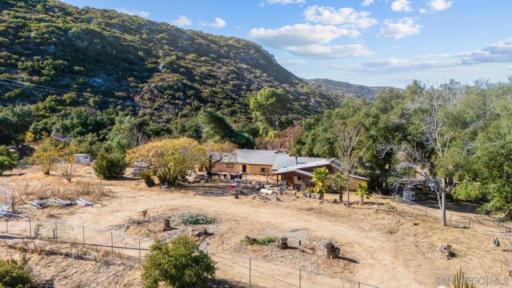 Opportunity knocks in Campo, Priced below appraised value! Escape the commotion of the city and retreat into a delightfully secluded valley, situated on over 2 acres. Turn this 3 bedroom, 1 bathroom ranch home into your own! Nestled under 100 year old trees and surrounded by mountain views. The property features a big 57'x18' workshop/garage including a large bonus room waiting for conversion into extra living space. A high producing well and plenty of usable land for homesteading. Conveniently located near Lake Morena to fish and enjoy all that nature offers.