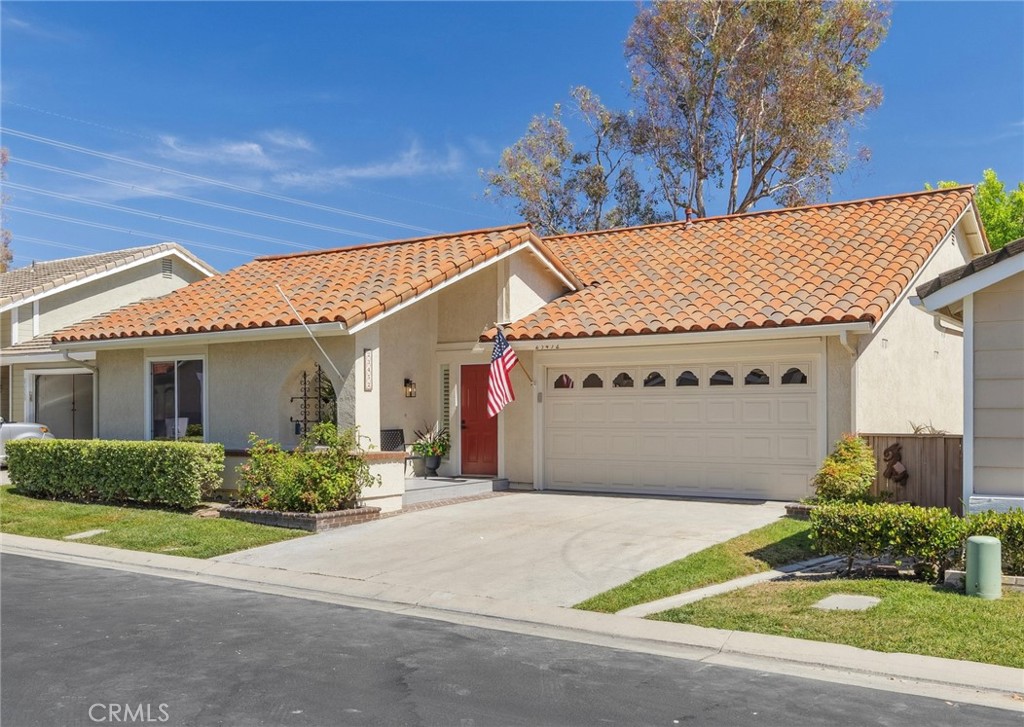 Welcome to Casta Del Sol 55+ Community! This Gated community features beautiful single-story homes with access to nearby Lake Mission Viejo, fantastic amenities, and views of the surrounding lush green hills. As you walk into this COMPLETELY REMODELED SINGLE STORY Rosa floorplan, you will notice the open layout, vaulted high ceilings, with multiple windows providing serene views of the rolling hills. Nestled near the top of the hill on an elevated street with privacy, one can enjoy the views of the hills. In front entry, you'll notice the modern matching ceramic tiles both in front and in the rear patio. To your left is the Master Bedrooms suite featuring vaulted ceilings, direct access to walk in closet with built in shelving and a remodeled master bathroom. A walk-in shower with frameless glass doors facing the remodeled quartz countertops, custom matching mirrors, vanity lights all with a modern touch. Main Hallway leads a remodeled kitchen that now features a HUGE kitchen Island. The entire home features beautiful and durable luxury vinyl plank flooring, recessed lighting, and new windows and sliders throughout. The Laundry area has been re-configured to be located and easily accessible INSIDE the home. The laundry area has also been fitted with cabinets for linens and additional storage. Brand new washer dryer included as well as brand new Refrigerator and kitchen appliances. Central Air throughout home, a large 2-car garage with driveway, a newer garage door and accessible large attic space above garage for additional storage. Sliding door leads to a side yard where you'll find the AC Condenser unit, and two brand new Vinyl Gates. Rear patio features partially covered patio and open patio with custom tiles to relax, bird watch, and enjoy the cool ocean breezes as you enjoy the elevated views of the surrounding hills. The 2nd bedroom has a wonderful unimpeded view of the hills and close access to remodeled guest bathroom. 3rd bedroom has been converted into a LARGE dining room area also with fantastic views. The flexible floor plan allows this room to potentially also be utilized as a den/study. Adjacent to the kitchen is a dry bar area with built in wine/beverage fridge and cabinets with extra counter space. Casta Del Sol residents enjoy amenities including, pool, spa, outdoor cooking areas, picnic areas, sport courts, billiards, recreational room, library, with Oso Creek Golf Course bordering the community as well. This one won't last long!!!