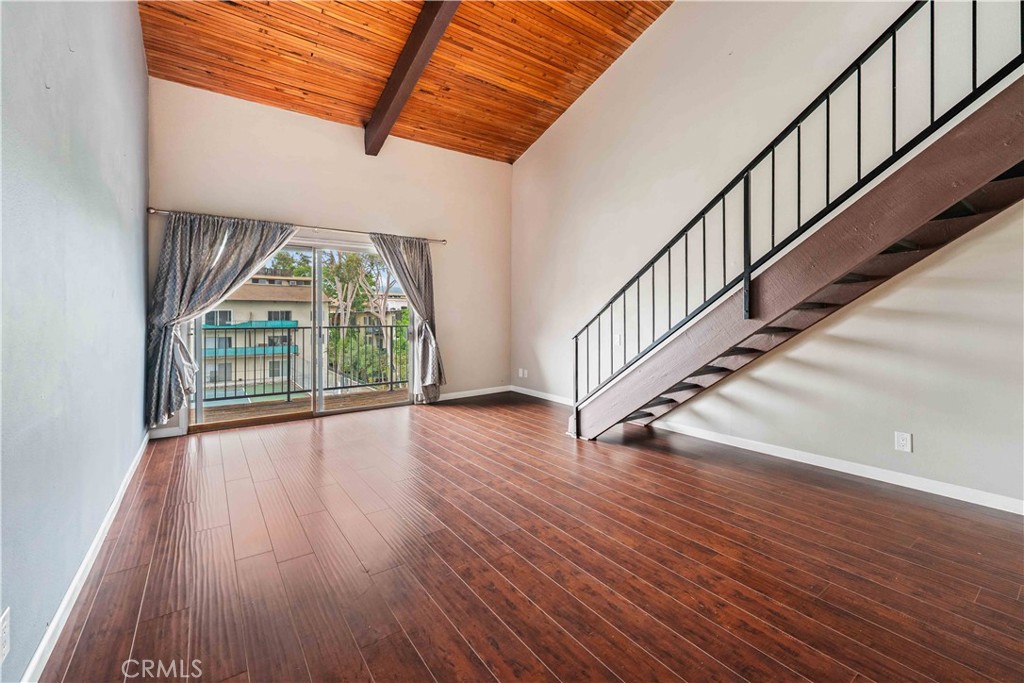 Reduced- Back On Market! $285,000 for Cash Buyers only- Great for Owner occupied or Landlord Investor. Much sought after two story spacious loft unit offers 2 bedrooms, 2 full baths, high ceilings throughout and Large Walk-in closets and lots of extra storage within this 1009 sq ft home. Serene location in Building E, at the rear of the complex. Bright, open floorplan boasts vaulted wood ceilings, beautiful dark manufactured plank style floors, and sliding glass doors leading to wood balcony overlooking the rarely used Tennis Courts. The adjacent dining area is illuminated by a charming crystal chandelier and provides an extra storage closet as well. The charming modern kitchen opens to living room and features ceramic tile floors, white farmhouse door cabinets with double stainless steel sinks, all crowned by granite counters and enhanced by quality stainless steel appliances: Built-in Dishwasher, Black top electric oven-range, over the range Microwave, and refrigerator. One updated full bath and adjoining bright bedroom is located on this level, complete with an open closet/storage area and a double door mirrored organizer closet. The spacious loft suite is the pièce de résistance at the top of the living room staircase. This gorgeous master suite with beautiful privacy screen is complete with TWO Walk-in closets, additional attic storage, and a room A/C for extra comfort. Plus the double mirror vanity dressing area sits outside the updated bathroom with tub / shower combination. The convenient laundry room is located within the building, and the 2 space tandem covered parking (283, 284) at the left of the rear first floor stairs. The Encino Oaks Community features a large fenced pool, separate spa, gym, sauna, clubhouse, 3 tennis courts, and on-site property manager. The convenient location is ideal for 101 & 405 commutes, shopping, restaurants, golf courses, parks, picnic, walking, Trader Joe's, and more. HOA covers earthquake insurance, water, trash.