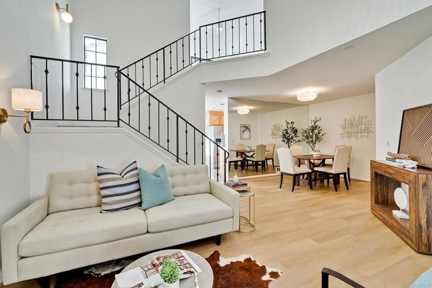 Exceptional End-unit townhome-style condo, nestled in Andalusia Gated community in the Central Fremont. Spanning 1,578 Sq.Ft two-story floorplan, 2 Beds, 3 Full Baths & a bright loft perfect for home office, or creative studio.  * Dramatic living room w/soaring vaulted ceiling, a warm fireplace; * Chef's kitchen complete w/SS appliances, Gas range, Refrigerator, plenty of storage cabinets, pantry. Sunny dining area framed by large garden window w/custom remote-controlled solar shades; * Primary Suite is boasting its own vaulted ceiling, fireplace, spacious walk-in closet; * Comfort zoned Heating throughout the house and individual combo A/C & Heating units in each bedroom; * Laundry conveniently located on the top floor (washer & dryer are provided); * Ample storage space located off the veranda-style upper, also niches within the private secondary stairwell and providing easy access between upper balcony, kitchen to attached garage. * 3 private Balconies; * Attached garage plus a dedicated 2nd parking space; The resort-style HOA amenities include pool, spa, clubhouse, plus covers Water, Water Heating, Roof, Trash, Hazard Insurance and Gated security. Prime Location: nearby Lake Elizabeth, Central Park, Fremont Library, Fremont Hub. Easy access to BART & Fwys 880, 680, 84.