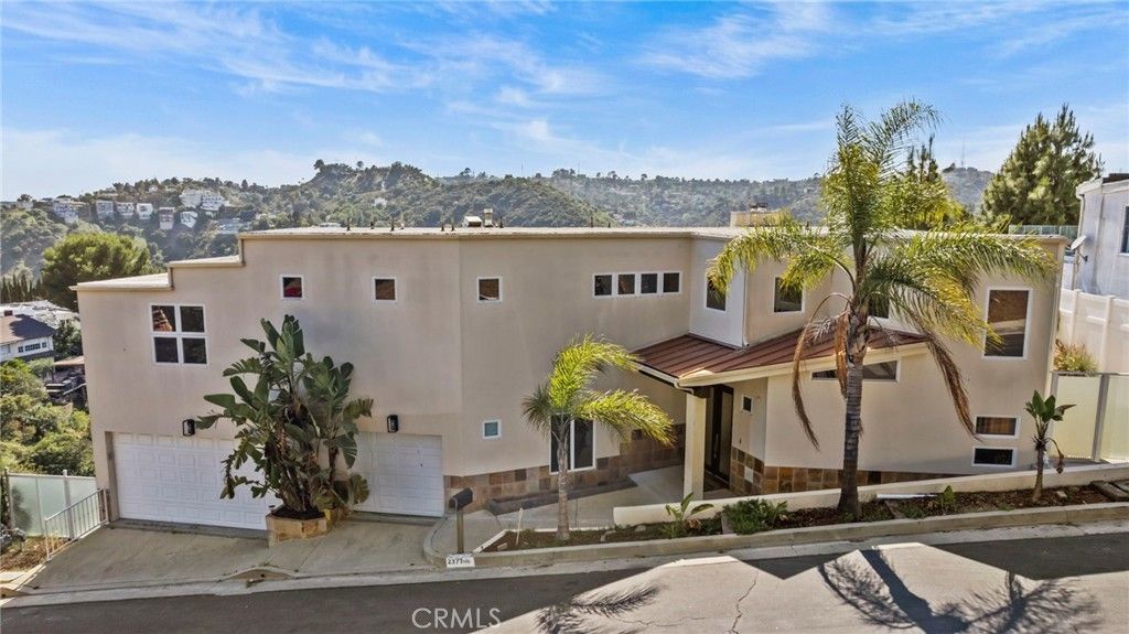 Photo of 2377 Mount Olympus Drive, Los Angeles, CA 90046 (MLS # TR25121511)