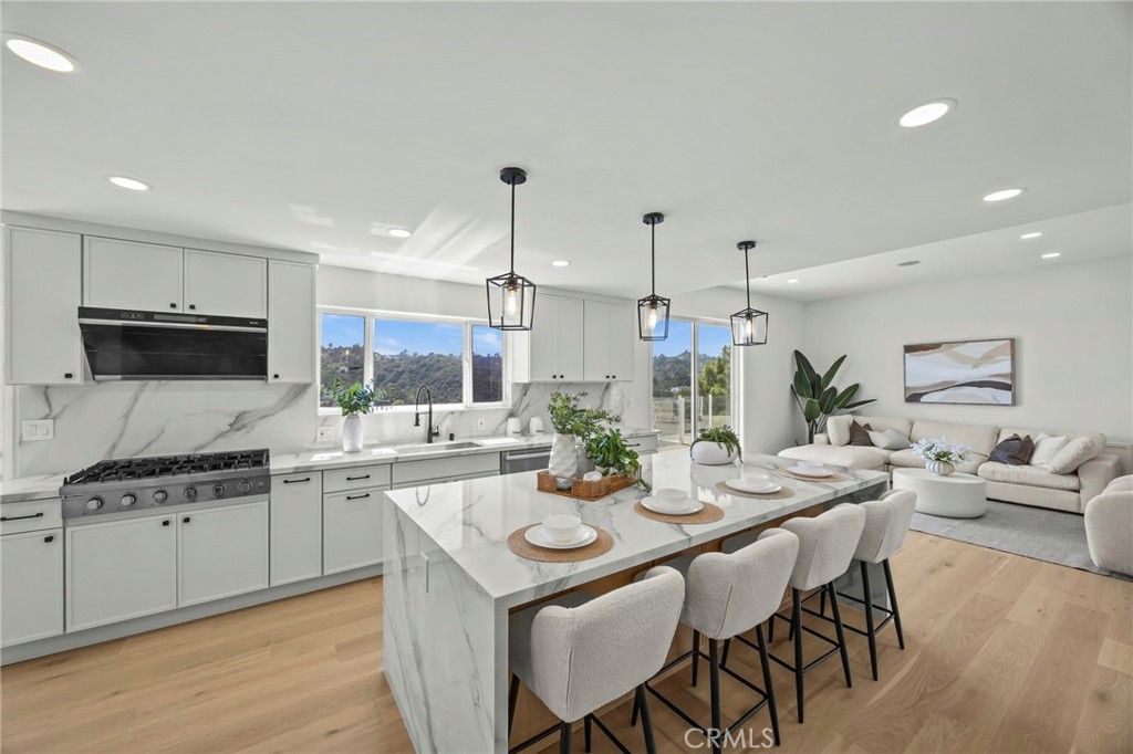 Photo of 2377 Mount Olympus Drive, Los Angeles, CA 90046 (MLS # TR25121511)