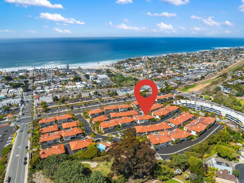 Coastal Luxury with Stunning Whitewater Views; Welcome to the Crown Jewel of Hacienda de la Playa! A move-in-ready, designer-upgraded coastal retreat. Offering breathtaking whitewater views of Moonlight Beach, this home embodies the best of Encinitas living—just minutes from the beach, downtown Encinitas, and all the vibrant amenities this coastal town has to offer. Step inside to discover a beautifully appointed turnkey interior featuring high-end designer finishes, luxury flooring, an updated kitchen with marble countertops, premium stainless steel appliances and fully updated bathrooms. The open-concept living space is bathed in natural light, featuring large french doors that frame stunning coastal vistas from the living & dining rooms as well as both bedrooms. With private balconies on both sides and no adjacent units on either side, this is a premiere model within the community. This home is ideal for those who crave walkability and convenience, with Encinitas’ best restaurants, boutique shops, and train station just minutes away. Whether it’s a morning surf session, a sunset stroll along the sand, or an evening out in downtown Encinitas, this location puts it all at your fingertips. Complete with a private attached garage, and access to beautiful community spaces including a pool and a jacuzzi, this rarely available coastal gem offers the perfect blend of luxury, comfort, and coastal charm. Don’t miss this opportunity to own one of Encinitas’ finest ocean-view properties—schedule your private tour today!