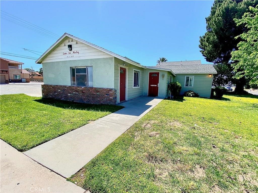Unique Mixed-Use Opportunity in the Heart of Rialto – Zoned Cottage Commercial!
This versatile 4-bedroom, 1.5-bath property offers endless possibilities and is perfect for investors, business owners, or developers. Conveniently located near Downtown Rialto, this corner lot features a circular driveway, ample parking, including handicap-accessible spaces, and a spacious front yard with mature shade trees. Inside, you’ll find a welcoming entry walkway leading to a reception area, family and living rooms, and a dedicated office space, making it ideal for a home-based business or commercial use. The property also includes two detached bonus rooms, perfect for storage, creative workspaces, or additional office space. The large backyard and lot layout offer excellent potential for future expansion, and this property qualifies for the addition of an ADU (Accessory Dwelling Unit). Buyers are encouraged to contact the City of Rialto to explore redevelopment incentives and permitted commercial/residential uses under its flexible Cottage Commercial zoning. This is an ideal opportunity to generate income while planning your vision. Don’t miss out on this rare find with so much potential!
