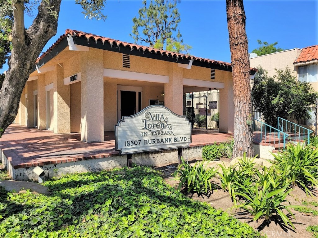 Welcome to Villa Lorena in Tarzana. This updated and move-in ready upper-level condo has 2 bedrooms and 2 bathrooms with 1040 square feet. The condo features a kitchen with stainless steel appliances and new wood laminate flooring, a dining room, spacious family room, smooth ceilings with recessed lighting, a primary suite with an ensuite bathroom featuring an updated vanity and a wall of mirrored closet doors, a secondary bedroom with both mirrored closet doors and a walk-in closet, and a private balcony off the family room. The community of Villa Lorena has lush grounds, walking paths, a beautiful pool area, two spas, and laundry facilities. Also included are two assigned side by side parking spaces. Located close to the 101 freeway, Ventura Blvd, restaurants, and shopping.