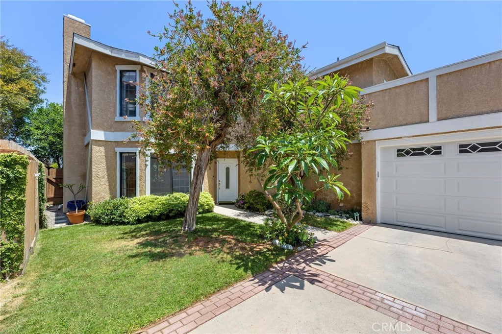 Welcome to 2007 Dufour Avenue— a quiet and private rear-unit townhome nestled in the heart of North Redondo Beach. Upon entry, you're welcomed by a formal living room, complete with a cozy fireplace and an oversized bay window that fills the space with natural light. Just beyond, a spacious den/family room connects effortlessly to the backyard through double doors, creating seamless indoor-outdoor flow. The thoughtfully designed kitchen features stainless steel appliances, a double wall oven, a large pantry and breakfast bar seating, perfectly positioned to flow into the dining area, making everyday meals and entertaining feel natural and connected. Throughout the main level, you'll find recessed lighting, in-ceiling speakers, a convenient guest powder room, a laundry area and a large storage closet. Upstairs, the primary suite is a calming retreat, filled with light and complete with a spa-style ensuite featuring a large glass shower and a generously sized walk-in closet. Two additional bedrooms with ample closet space offer flexibility for family, guests, or a home office, with one opening to a large private rooftop terrace — a perfect outdoor bonus space. An additional full bathroom completes the upper level. Outside, the backyard includes a spacious patio and grassy lawn, designed as a natural extension of the interior living spaces for entertaining or unwinding. A direct-access two-car garage provides added convenience and storage, along with a separate laundry room. With its quiet setting, functional layout, and rare outdoor spaces, 2007 Dufour Unit B captures the best of North Redondo living. Located just minutes from the beach, downtown Manhattan Beach, and a variety of local shops and restaurants, the property also enjoys close proximity to top-rated schools including Lincoln Elementary, Adams Middle, Redondo Union High School and/or option for Mira Costa High School in this prime location considered "Area of Choice" (buyer to verify all school assignments).