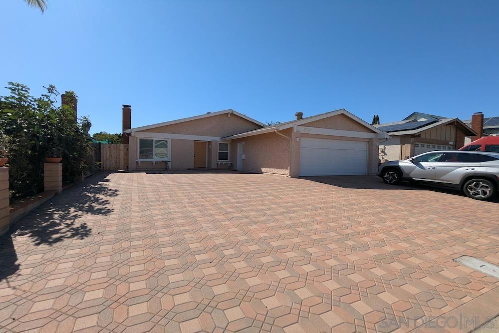 This bright and open home offers a versatile floor plan that feels larger than expected, with three bedrooms and two bathrooms plus the option to create a fourth bedroom. The oversized master suite can easily be divided or reimagined as a bedroom and office, gym, or music room combo. The modern kitchen has been fully upgraded with a new stovetop, dishwasher, and a built-in oven/microwave featuring double-oven and steam-baking functions. The open kitchen-dining space is filled with natural light and abundant smart storage with pull-outs and drawers. Fresh paint in the living, dining, and hallway areas and new vinyl flooring throughout the main living spaces add a clean, contemporary touch. Color-adjustable lighting fixtures are installed throughout, with dusk-to-dawn lighting for the garage. Additional highlights include central A/C and gas heating, a new hallway closet with storage and display functions, select replaced electrical breakers with a new subpanel installed by a certified electrician, and a brand-new washer and dryer. The large garage—complete with its own heating and cooling—is not counted in the home’s square footage, giving you even more usable space. Solar panels are included for energy efficiency. Enjoy outdoor living with a covered patio and breezy summer shade, backyard sprinklers for easy maintenance, and a spacious front parking area with room for multiple cars or an RV. Located on a quiet, cul-de-sac-like street, this home is walking distance to parks, Erickson Elementary, and local trails, just steps from the community pool, and close to shopping.