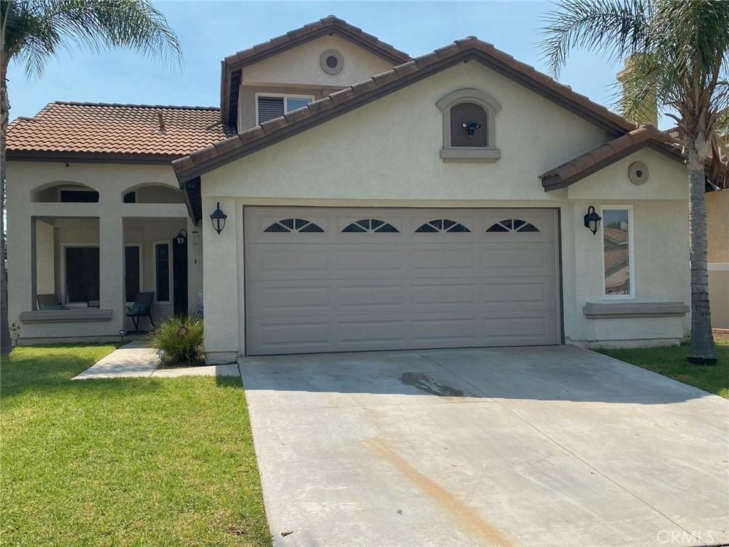 Cul-de-sac Gem! Nice Beautiful home in Corona, that offers 4 bedrooms and 3 bathroom. One bedroom downstairs, family room with fireplace that open up to kitchen, living room has high ceiling, primary bedroom is a nice size with a huge bathroom. Backyard has covered patio. This house is located on a quiet street, great location with shopping center in walking distance. This house is a must see to appreciate more pictures to come.
