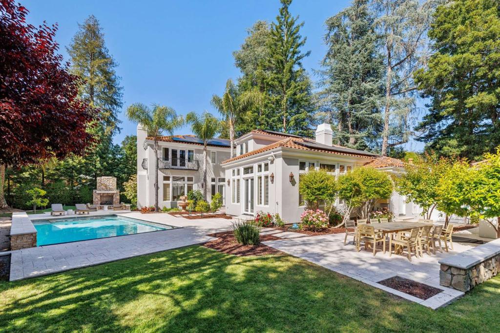 Reflecting the finest of California architecture, 6 Camino Por Los Arboles is an elegant Mediterranean style home situated in central Atherton near the Circus Club. This gated, trophy property with its prestigious address and elegant beauty awaits the discerning owner. Walk into a grand entry with high ceilings and elegant formal rooms. Enjoy a large separate office, spacious kitchen and enormous family room.ÃÂ Two levels boasting 5 bedrooms, each with en suite bath, including in-law on main level. Primary suite with luxurious bath, heated floors and private office or fitness center. Entertainers paradiseÃÂ with solar-heated pool and spa, 9-hole putting green with sand traps, batting cage, sport court, plus fireplace and bbq terraces. Within walking distance to the Circus Club, Sacred Heart School, and Menlo School. A short drive to Sand Hill Road, Stanford University and the town centers of Menlo Park and Palo Alto. Top Menlo Park schools.