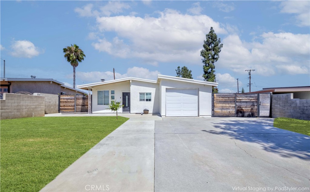 Stunning Remodeled Single-Level Home in prime West Covina! Welcome to this beautifully upgraded 3-bedroom, 2-bath gem, offering approximately 1,417 square feet of thoughtfully designed living space on a spacious 7,640 square foot lot. From the moment you arrive, you’ll be drawn in by the oversized driveway and fresh exterior paint that give this home standout curb appeal. Inside, the open-concept layout seamlessly connects the living room, formal dining area, and fully remodeled chef’s kitchen. The kitchen is a true highlight, featuring sleek quartz countertops, custom white cabinetry, stainless steel appliances, a large sink, and abundant recessed lighting. The primary bedroom includes a vaulted ceiling and individual stand-up closet, while the two additional bedrooms are generously sized, one with its own stand-up closet and the other with ample closet space, connected by a beautifully remodeled Jack & Jill-style bathroom with a shower-in-tub combo. The hallway bath has also been fully updated, featuring a separate vanity with quartz counters and stylish finishes throughout. The home has undergone over $150,000 in upgrades, including all-new water lines and commercial-grade concrete work. Additional highlights include fully remodeled kitchen and bathrooms, gorgeous laminate flooring, convenient indoor laundry, a 1-car garage, and gated RV or boat parking potential. The expansive backyard offers plenty of space for entertaining, or the addition of a pool or ADU. Located just minutes from shopping, parks, highly-rated schools, dining, and entertainment, with easy access to the 10 Freeway. This turnkey property offers the perfect blend of style, function, and convenience. Don’t miss your opportunity to make this beautifully remodeled home yours. Schedule a private showing today!