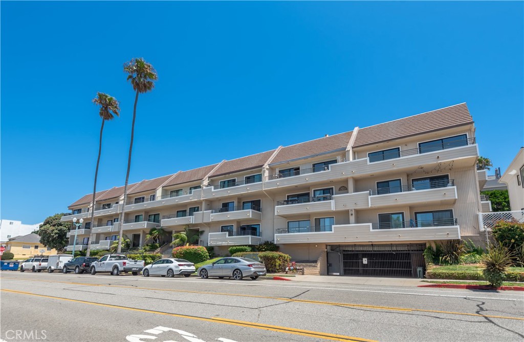 Wonderful Baypoint Condominium complex with just 40 units in the property. Located just steps from the Topaz Jetty beach access and walking distance to both the RB Pier and Hollywood Riviera Village. 1,237 sq ft of living space with a peek of an ocean view from the kitchen, dining, and living areas. 2 bedrooms with excellent closet space and 2 baths. Large open kitchen was remodeled with granite counter tops. The unit offers convenient in-unit washer and dryer hookups. Newer sliding glass doors open onto a spacious deck from the living and primary bedroom areas. New carpet and freshly painted. Popcorn ceilings have been removed. This complex has secure access and has a great gym/exercise room, storage room and 2 convenient parking spaces by the elevator.
