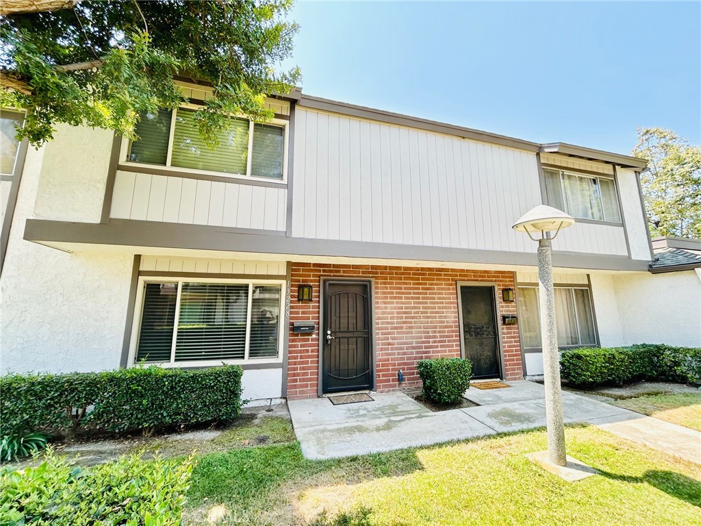 Move-in-ready - 3 bedrooms and 2 baths (bathtub upstairs & shower downstairs) townhouse located in the beautiful Brookdale community. The home features laminate wood floor, upgraded kitchen with granite countertop & glass backsplash, remodeled baths, dual pane windows, scraped ceiling and recessed lighting thru-out. It has a low maintenance yard with planter and newer vinyl fence on both sides. 2 car garage with laundry hook-up that leads into the yard and access to the home directly. HOA recently painted the exterior and installed newer roof. Amenities include pool, clubhouse and children playground. Best of all - unlike other condominium/townhouse community, there is plenty of parking thru-out the HOA and association allow for a 3rd and 4th car to be parked outside with permit. Guest parkings are also plentiful thru-out. Conveniently located near the 22 and 405 freeways, Disneyland, Rodeo 39, public transportation, churches, schools and shopping center.