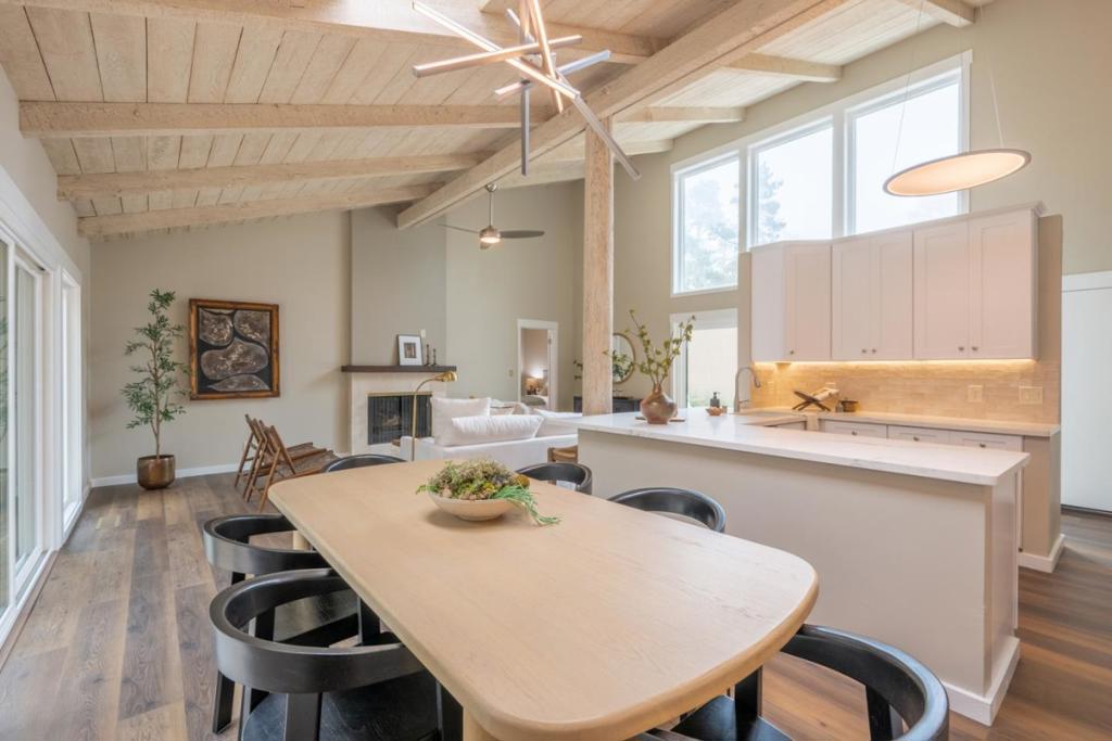 Tucked in the desirable Sunridge Pines neighborhood of Pebble Beach, this beautifully updated single-level home offers 3 bedrooms, 3 baths, and a seamless blend of modern style and timeless coastal charm, perfect for a full-time residence, second home, or rental property. Vaulted ceilings, abundant natural light, and an open floor plan create an inviting space for both everyday living and entertaining. Upgrades include new flooring throughout, fresh paint inside and out, energy-efficient windows and doors, and new LED lighting fixtures, from recessed and under-cabinet lighting to warm kitchen uplighting, along with other thoughtful improvements. The kitchen features quartz countertops, shaker cabinetry, a fireclay sink, stylish backsplash, and new Bosch appliances. Bathrooms are tastefully remodeled, with the primary suite boasting a freestanding soaking tub and frameless glass shower. Outdoors, enjoy drought-tolerant landscaping, new fencing, a resurfaced driveway, and a detached two-car garage. Ideally located just minutes from Pebble Beach Golf Links, Carmel-by-the-Sea, and the charming shops, galleries, and beaches of the Monterey Peninsula, this move-in-ready home delivers coastal living at its finest.