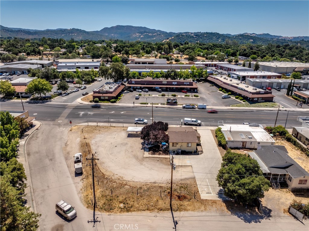 Mixed-Use Corner Lot on Prime El Camino Real
Presenting a rare opportunity—a 17,860 sqft mostly flat parcel at 8575 El Camino Real, perfectly positioned on a high-traffic corner in downtown Atascadero. Featuring a well-maintained 936 sqft building, this Commercial Retail (CR)-zoned property accommodates a broad array of uses—from restaurants and shops to service businesses—designed to meet the daily needs of both local residents and regional visitors.
Strategic Zoning & Development Upside
The CR zoning supports an extensive range of retail and service operations, with the potential for mixed-use development including residential units on the 2nd floor or above.
. Whether you're planning a commercial storefront, café, office or even vertical mixed-use, this site offers flexibility and long-term growth potential. The corner location with El Camino Real frontage adds exceptional visibility and customer exposure.
For detailed allowable uses, development standards, or to explore mixed-use possibilities, please consult with the City of Atascadero Planning & Building Department.