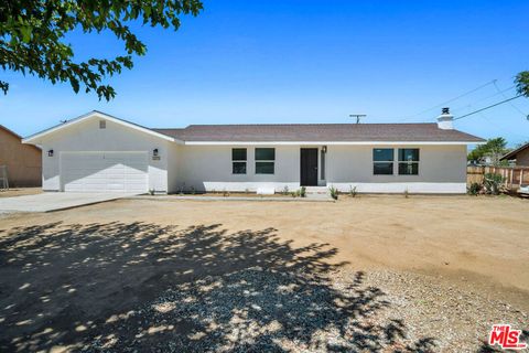 Photo of 15376 Washoan Road, Apple Valley, CA 92307 (MLS # 26632513)