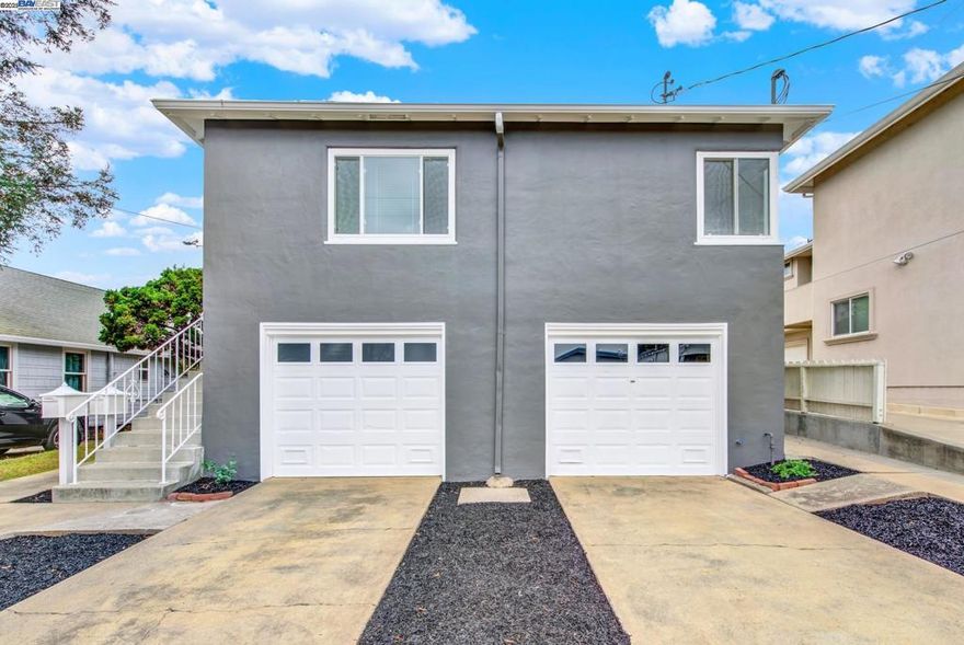 Looking for a smart investment or your next home with built-in income potential? Welcome to 3627 Loma Vista Avenue, a beautifully maintained duplex offering timeless charm, thoughtful upgrades, and flexible living options. Move-in ready and freshly painted, this two-unit property is ideal for both owner-occupants and investors. The lower two-bedroom, one-bath unit features refinished hardwood floors, a bright two-tone kitchen with new tile flooring, and cabinets updated in crisp white and navy hues, complementing the home’s classic tile counters. The bathroom has been given a fresh look with newly painted walls and cabinetry, offering a clean and inviting feel. Upstairs, the one-bedroom, one-bath unit is well-kept and currently tenant-occupied, providing immediate rental income. Notable upgrades include a new roof, updated electrical and plumbing systems, and a Halo 5 whole-home water filtration system, ensuring high-quality water throughout the property. Whether you’re house-hacking your way to homeownership or expanding your investment portfolio, this duplex combines comfort, practicality, and long-term value in one of Oakland’s most convenient neighborhoods.