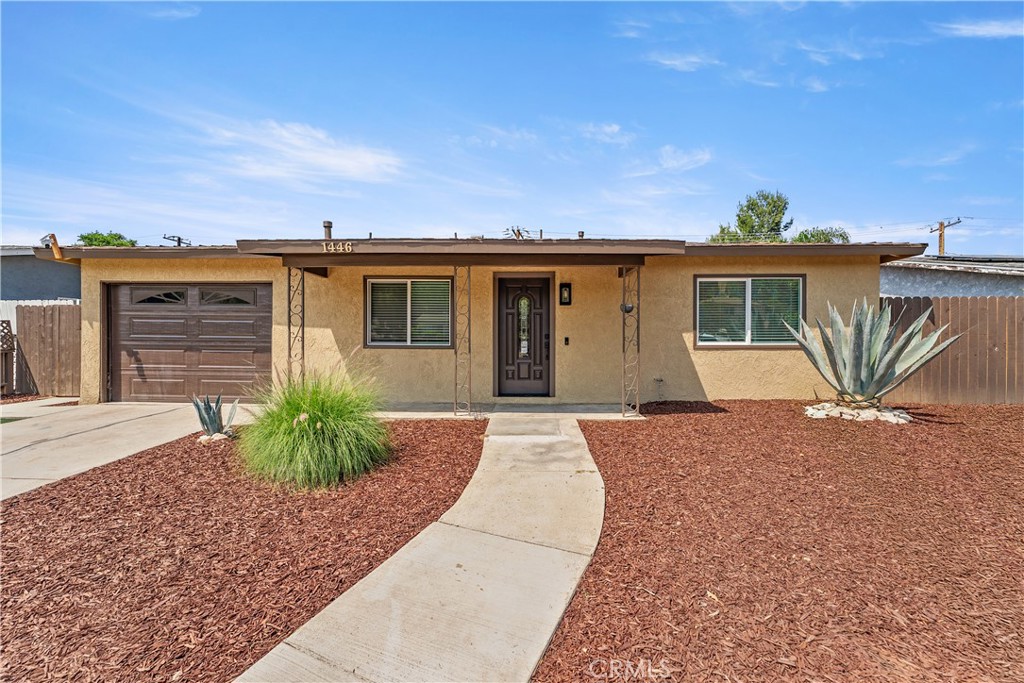 BACK ON THE MARKET! Move in ready looking for a quick close look no further! This home is tucked into a peaceful neighborhood in North San Bernardino, this charming five-bedroom two-bathroom home offers a blend of modern upgrades and serene outdoor living. Looking for a comfortable primary residence this property presents a well-rounded opportunity with thoughtful design and functionality. Discover a space that has been updated with $100,000 in improvements the home features new energy saving windows doors that not only enhances efficiency but invites abundant natural light throughout. The upgraded flooring flows from room to room complementing neutral color scheme. The kitchen impresses with sleek countertops contemporary cabinetry and updated high end appliances that make modern cooking easier than ever. Bathrooms have also had a complete refresh featuring modern finishes that elevate both form and function. The primary bedroom includes generous closet storage space. The second, third, fourth and fifth bedrooms line up comfortably and can serve as an additional bedroom for little ones or out of town guest rooms, home office, theater room. The quality of build is evident in every detail, from structural updates to daily use amenities. Upgraded 200-amp panel and solar ready setup, this home is future forward in energy capacity, it's ready to expand technology or solar installation when you’re ready. Step outside and you'll find a landscaped front yard creating the perfect setting for outdoor relaxation. Mature plants, clean hardscaping, and greenery means you're not just buying a house you’re gaining a private oasis. Just around corner is Cal State San Bernardino, making it an ideal location for anyone connected to the academic community. For daily errands or spontaneous shopping runs, all time bargains are just a few minutes' drive, while Blair Park offers green space for recreation or quiet walks. Even public transportation is within reasonable distance, adding to the property's connectivity. With so many major upgrades already completed, and with summer heat beating down on us already this home has brand new central air conditioning system and furnace for those cozy winter temperatures this move-in ready home invites new owners to enjoy peace of mind and long-term comfort. Whether you're upsizing, rightsizing, or simply seeking a comfortable place to settle into, this thoughtfully updated property offers great value in a well-established community.