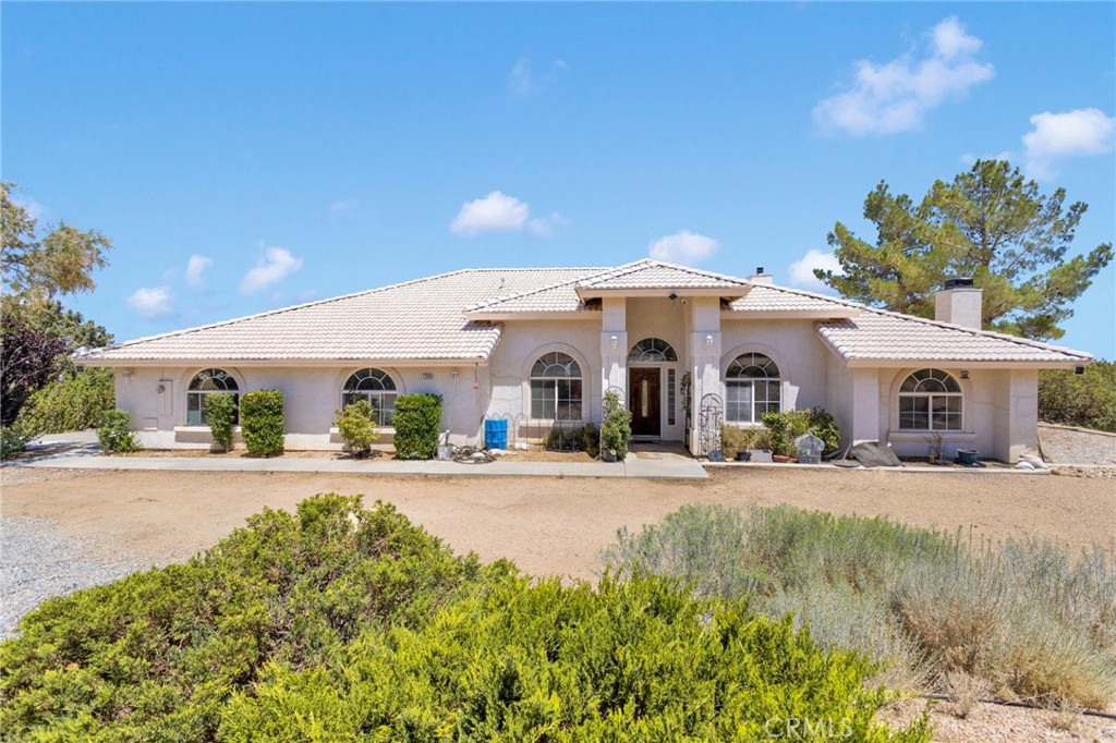 This spacious 3-bedroom, 3-bathroom home offers comfort, character, and plenty of room to spread out. Inside, you’ll find a generous floorplan featuring two cozy fireplaces plus a wood-burning stove—perfect for chilly desert evenings. The expansive kitchen opens to the family room, creating a warm and inviting space ideal for entertaining or everyday living.
Each bedroom is well-sized, and the three bathrooms provide convenience for family and guests alike. With multiple living areas, there’s flexibility for a home office, playroom, or additional gathering space.
Set in the serene high desert with wide-open skies and beautiful views, this property offers the peaceful lifestyle Pinon Hills is known for, while still being close to Highway 138 for an easy commute.
Don’t miss your chance to make this charming desert retreat your own!