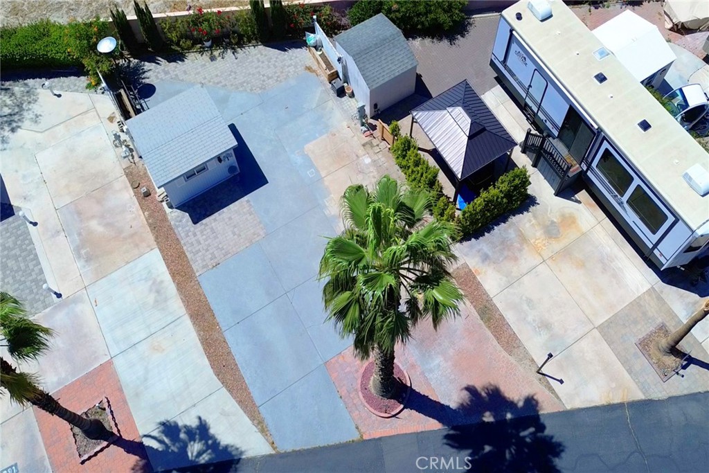 LOCATION! Highly sought after 55+ Seasonal Living "Desert Shadows RV Resort" RV VIEW Lot Now Available! You Own Land! Grant Deed Lot with Water, Cable, Trash, and common area included in HOA! Amazing amenities! 2 large & well-maintained clubhouses plus 3 additional satellite clubhouses, An indoor pool with a large spa and sauna, An olympic-size lap pool, A total of 6 pools, 5 spas and 3 saunas, Sunken, lighted tennis courts, 8 Pickle-ball courts, An indoor shuffleboard pavilion, 16,000-square foot San Jacinto room with floating hardwood dance floor, and a professional stage, plus a large kitchen, A 3,000-square foot “Our Gang” party room and lounge with a giant fireplace and kitchen, A huge party terrace with mountain views, A fully equipped fitness center, A dance studio, Library, Billiards room, Horseshoe pits, Several laundries, restrooms and bath facilities, Card & hobby rooms with Pottery Kiln, A putting green, Organized fitness activities, Daily activities including dances, dinners and entertainment, Wi-Fi and wired broadband Internet access. Close to everything!