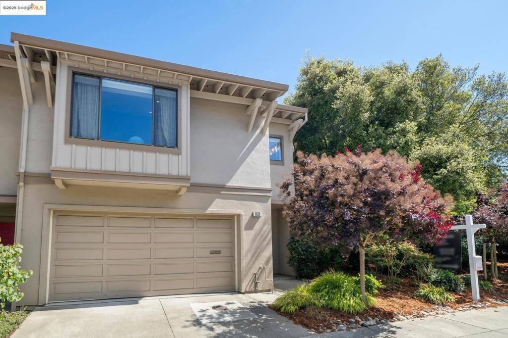 Escape to your private canyon retreat in Hiller Highlands' coveted townhome enclave. This immaculate 3BR/2.5BA end unit feels like a tree house hideaway with beautiful lush canyon and mountain views cascading from two balconies. Dramatic vaulted ceilings soar overhead while natural light pours through every window of the clever split-level design. Step through the welcoming foyer into a completely transformed kitchen where culinary magic happens with gleaming new cabinets, stunning countertops, premium appliances, and that perfect wine fridge for evening unwinding. Recent $48K in upgrades include premium flooring throughout, dimmable recessed lighting, smart washer/dryer, and newly installed bidet. Your attached two-car garage keeps life simple with smart opener technology. The true luxury? You're embraced by wild canyon beauty maintained by HOA landscaping services, plus exclusive access to join Highlands Country Club with no waitlist where tennis courts, pool, hot tub, saunas, and BBQ areas await. Quick escapes via Highway 24 and Rockridge BART keep you connected when needed. Views: Ridge