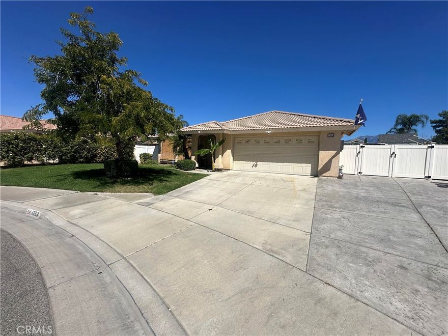 Welcome home to this charming single-story 3 bed, 2 bath residence ideally situated in a quiet cul-de-sac within the Rose Ranch community. Step inside to vaulted ceilings, a cozy fireplace, and updated flooring throughout. The galley kitchen with pass-through bar connects seamlessly to the living space, perfect for casual entertaining. Slide open the door from the master suite to your private backyard retreat, complete with a covered patio and low-maintenance landscaping. With a spacious lot, two-car garage, and the possibility for RV access, this home checks all the boxes. Just minutes from schools, shopping and freeways — your next chapter starts here!