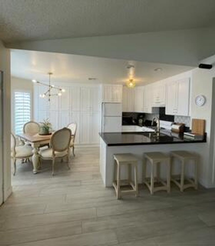 Welcome to this stylish and move in ready 2 bed/ 2 bath condo located in the desirable gated community of Royal Palms. This updated unit offers 925 square feet of comfortable living space with modern finishes and a functional layout.Inside, you'll find a brand new kitchen with generous cabinet space and a sleek breakfast bar--ideal for casual dining or entertaining. New flooring throughout the home adds a fresh, contemporary feel, while the in-unit stackable washer and dryer provide everyday convenience.The spacious primary suite features a large walk-in closet and an en-suite bathroom, offering a private retreat. A second bedroom and full bathroom complete the layout, making the space perfect for a variety of lifestyles.Additional features include carport parking, access to the community pool, clubhouse, and the peace of mind that comes with living in a gated neighborhood.Royal Palms offers a tranquil yet convenient location in the heart of Palm Desert--just minutes from world-class shopping and dining on El Paseo, top golf courses, parks, and scenic hiking trails.$3200 a month. Can be a seasonal or annual lease.