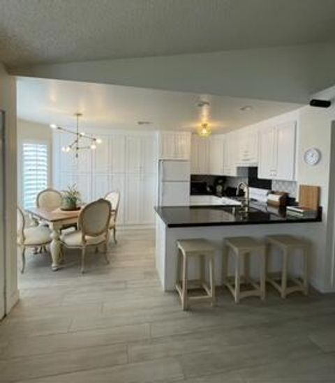 Photo of 40880 Whirling Wind Drive #C, Palm Desert, CA 92211 (MLS # 219136352DA)