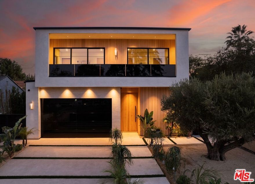 Welcome to this stunning modern new construction built and designed by the well renowned MLR Development. Located in the highly coveted Sherman Oaks pocket of Kester Elementary. Discover unparalleled luxury living at its best with high ceilings, floating staircase and offering 4 spacious bedrooms and 4.5 elegantly designed bathrooms. This architectural masterpiece blends contemporary design with functional living spaces. Step through the grand entryway into an open-concept floor plan that seamlessly integrates the living, dining, and kitchen areas, ideal for entertaining or relaxing. The gourmet kitchen is a chef's dream with custom Italian style cabinetry, a large island, and sleek finishes, featuring state-of-the-art Miele appliances including 2 ovens and a coffee machine. The large butler's pantry offers ample storage, food prep space, and a walk-in pantry. Each of the 4 bedrooms is a private sanctuary, complete with en-suite bathrooms that boast high-end fixtures, modern tile work, and spa-like features. The primary suite is a true retreat with a stone fireplace, offering a spacious walk-in closet and a luxurious bathroom with a soaking stand-alone tub, dual vanities, and a walk-in rain shower. Off of the primary suite is a patio, complete with built-in fireplace. A large upstairs laundry room with sink is both convenient and space efficient. The home is designed for comfort and convenience, with Control-4 smart home technology, surround sound, energy-efficient systems, and abundant natural light pouring in through floor-to-ceiling windows. Outside, the private backyard includes a covered patio, stone fireplace, recessed patio heaters, expansive pool and spa, built-in outdoor barbeque, pizza oven, smoker, and lawn perfect for outdoor dining and entertaining. Located minutes from top-rated schools, shopping, and dining, this home combines modern elegance with everyday practicality. Don't miss the chance to make this stunning property your own.