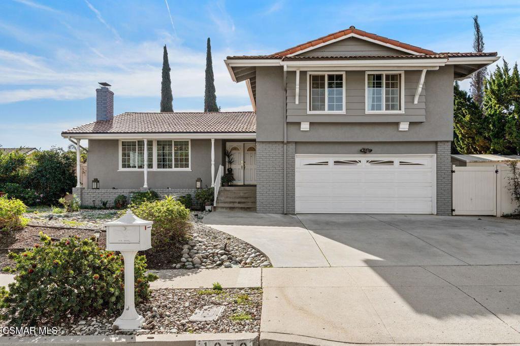 Welcome to this charming home in the highly desirable Sunset Hills neighborhood of Thousand Oaks. Featuring 4 bedrooms and 2.5 baths, this residence offers stunning sunrise and sunset views. Step through the impressive double door entry into an inviting foyer that opens to a bright, airy floor plan. The spacious living room and formal dining area are centered around a cozy fireplace, which is perfect for cool evenings. The dining room flows seamlessly into the upgraded kitchen, complete with granite countertops, stainless steel appliances, and abundant cabinetry. A sunny breakfast area and oversized windows fill the space with natural light while showcasing picturesque mountain views. Additional highlights include plantation shutters, generous storage, smooth ceilings, and a nearly new heating and air system (installed just two years ago). The kitchen and additional eating areas are filled with natural light from the oversized windows with stunning views of the mountains. The inviting outdoor space includes a beautiful deck. sitting, and grass areas. Whether you are hosting guests or enjoying a quiet evening at home, the large private entertainer's backyard provides the perfect setting with ample space for outdoor dining, lounging, and an abundant amount of room for pets and children to play. Nestled in a wonderful location near the Sunset Hills Golf Course, shopping, restaurants, parks, trails, and award-winning schools, this home offers great curb appeal and is move-in ready!
