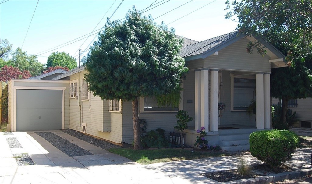 Charming starter home or investment property located in Alamitos Beach. Cozy 2-bedroom 1 bath with single garage and private patio. Hardwood floors and some original built-ins. Built-in bench seat in the kitchen for breakfast and free-standing range. Sliding door off the bedroom living area leads to the rear patio. Ceiling fans. Driveway will accommodate two vehicles. Laundry room. Currently rented month to month.