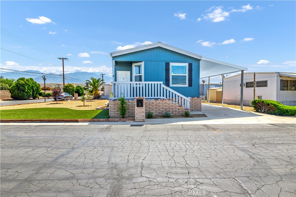 Come walk through this beautiful BRAND NEW Skyline Amber Cove Manufactured home on a huge corner lot. This 2bed 2 bath home is a perfect ready to move in 55+ community. The home offers offers approx. 960 sq ft of living space with a FIRE SUPPRESSION SYSTEM, stainless steel appliances, laminate countertops, carpet and vinyl flooring, plus an extended front porch. Low maintenance landscaping and 12X 40 carport attached.
Home comes with an extended warranty and a monthly space rent discount for the first six months.
Enjoy amazing views of the local mountains. The park has swimming pool, hot tub, clubhouse with kitchen, pool tables, an activity room, TV room, library and onsite laundry facilities. Hang out with your dog at our dog park or play horseshoes.
RV storage area to park your motorhome for a nominal fee. Close to shopping and restaurants and minutes from the town of Idyllwild.