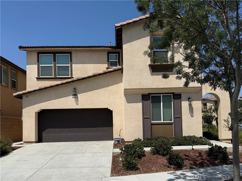 This spacious two-story residence located in the highly desirable Park Place community of Ontario Ranch, offers 4 bedrooms, 3 bathrooms, and 2,441 sq ft of well-designed living space. Paid off solar for energy efficiency. Nestled with no rear neighbors for added privacy. This home features open-concept living room, dining area, kitchen with large central island and ample cabinet spaces. Enjoy the convenience of a downstairs bedroom and bath, ideal for guests, office or multigenerational living. Upstairs, you’ll find a versatile loft space and laundry room; large primary suite includes a walk-in closet, dual sink vanity, soaking tub, and a glass-enclosed shower; two additional bedrooms and a full bath. Low-maintenance front and backyard . Resort-style HOA amenities, including a swimming pool and spa, tennis courts, fitness center, theatre room, and community clubhouse. Conveniently located near schools, markets, shopping, and dining.