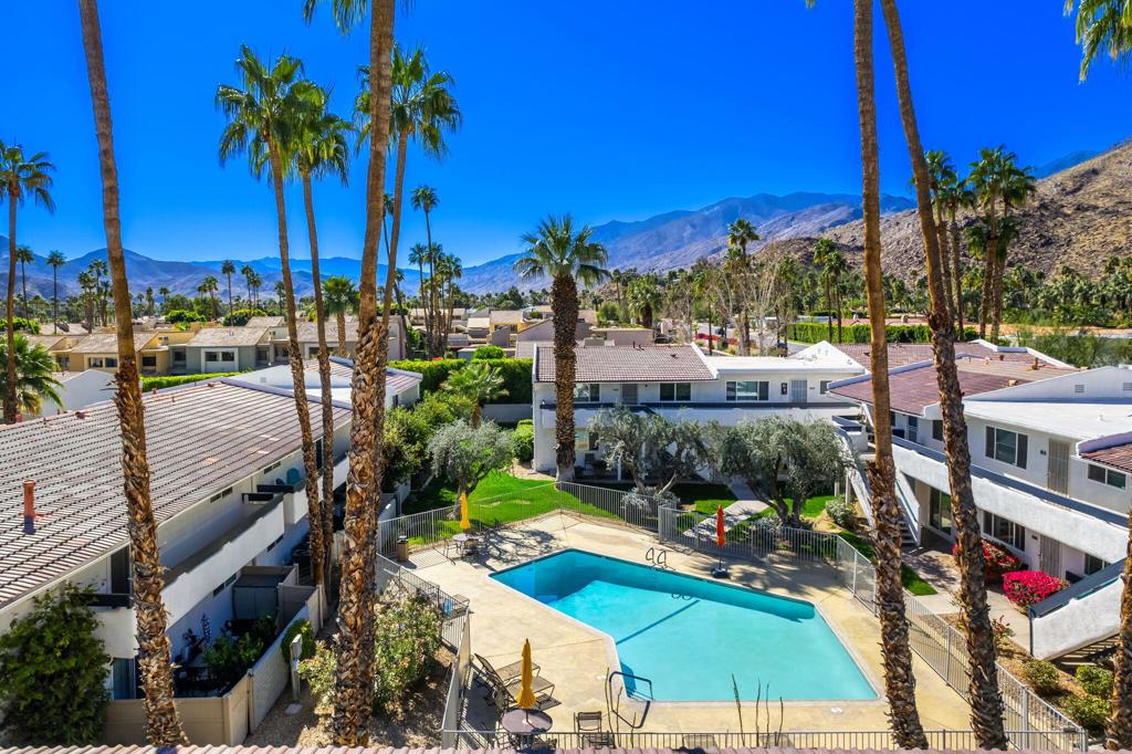 Don't miss the rare opportunity to own this upper level 2 bed 2 bath condo with sweeping views of the majestic mountains. Sandstone Villas is a secret oasis in South Palm Springs with tennis and pickle ball courts, multiple pools/spas and a community dog walking trail. This unit has a prime location in the community near two pools, a BBQ area and the fitness center. The unit has upgraded HVAC and generously sized bedrooms that have oversized closets with direct access to bathrooms.The two large patios are perfect to enjoy the valley's spectacular sunsets. HOA fees are reasonable and include gas, trash, sewer, exterior maintenance and a reserved covered parking space. Best of all, it is not leased land. With a 7-day rental policy, and close proximity to downtown, this unit will make a great investment or long-term home!
