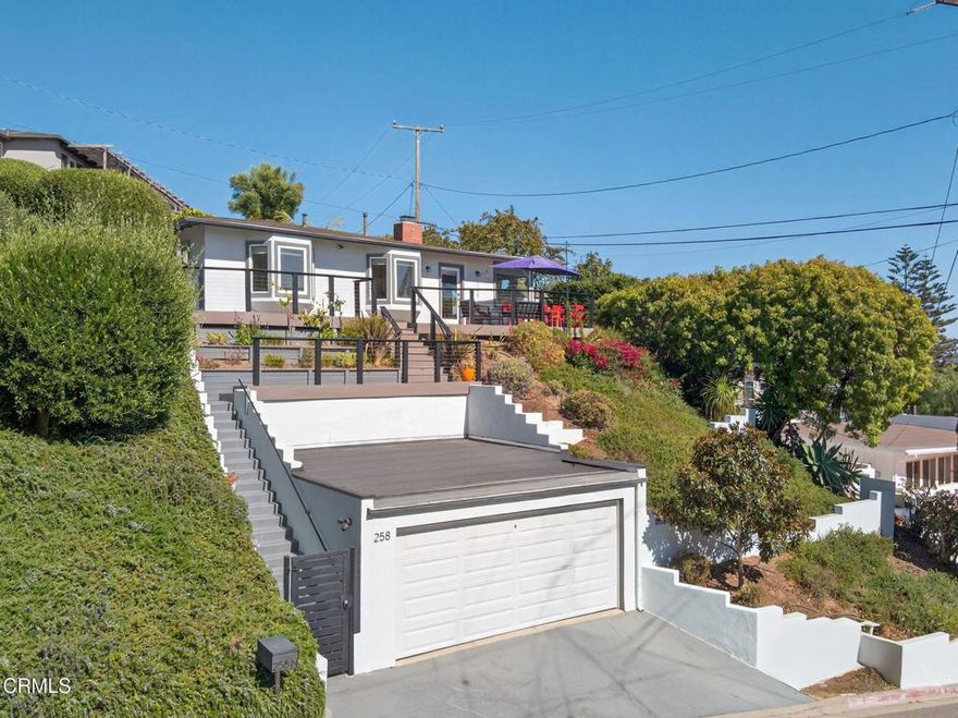 Classic Ventura hillside property with panoramic ocean, island and city views from almost every room! This stunning & meticulously cared for home is located in the prestigious Ventura Heights neighborhood within close proximity to downtown Ventura shops, restaurants, botanical gardens, and our beautiful beach, pier and boardwalk! Enjoy indoor/outdoor living with gorgeous (and private!) outdoor space on the beautiful custom deck spanning the length of the entire home, a wonderful spa, outdoor shower, and an outdoor pizza oven constructed with 1000 year old stone! The home has been recently updated and boasts a newer kitchen (2023) with custom cabinetry, appliances and quartz counters; luxury vinyl plank flooring, remodeled bathrooms, renovated garage (including reframed/raised garage ceiling, replaced garage door & roof, added electrical/lighting), dual pane windows and French doors, exterior lighting, and much more. The property is cheerful and bright, and the beautifully landscaped and terraced yard includes several fruit trees, lawn, and wonderful areas to relax and enjoy the sunsets. This is truly a special home and a fantastic opportunity to own on the coveted Ventura hillside! Look no further- visit to see the view, and experience the amazing pride of ownership!